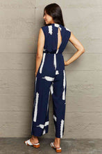 Load image into Gallery viewer, Printed Round Neck Cutout Jumpsuit with Pockets